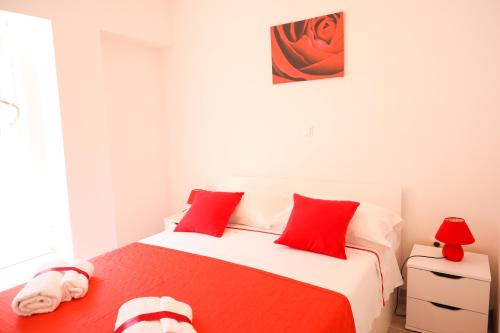Postel nebo postele na pokoji v ubytování Apartments Silva