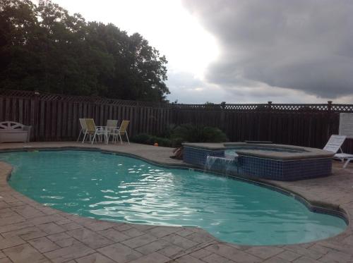 The swimming pool at or close to L'Acadie Inn & RV Park