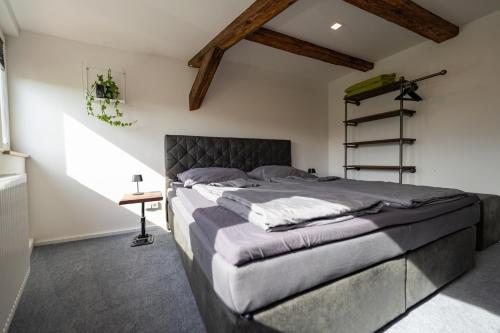 Llit o llits en una habitació de Apartments im Gerberhaus