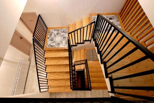 an overhead view of a staircase in a house at Mood Hotel Kazbegi in Stepantsminda