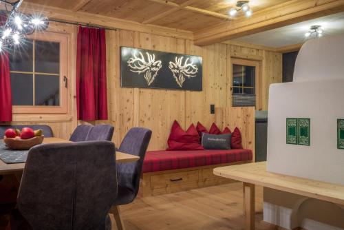 Posezení v ubytování Luxus Chalet Fasserhäusl