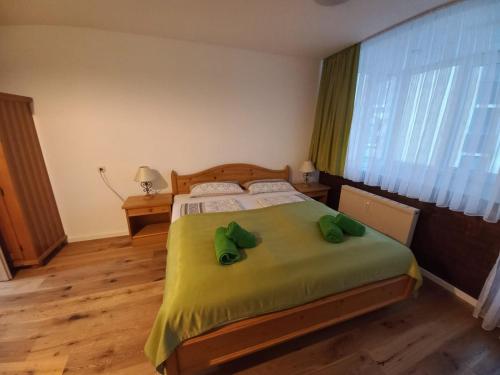 Posteľ alebo postele v izbe v ubytovaní Ferienwohnung Ausseerland