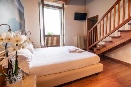Una cama o camas en una habitación de Il Bisteca