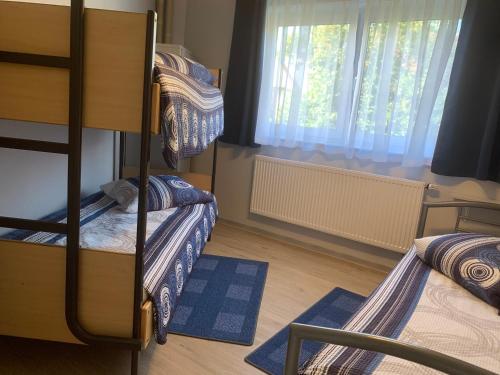 Postel nebo postele na pokoji v ubytování Ferienwohnung bis 8 Personen