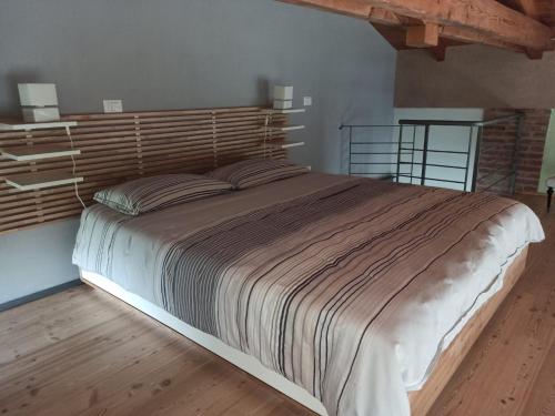 A bed or beds in a room at La gemella