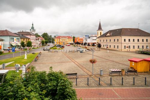 a view of a town square in a city at 2- posteľová izba s kúpeľňou RIŠKO v PENZION TRSTENÁ in Trstená