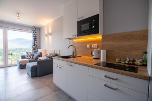 Kuchyňa alebo kuchynka v ubytovaní Apartament dla aktywnych (z pięknym widokiem)