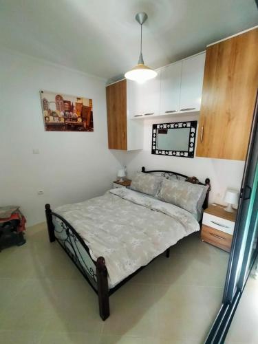 a bedroom with a large bed in a room at Maison 3 chambres Imi ouaddar in Agadir nʼ Aït Sa