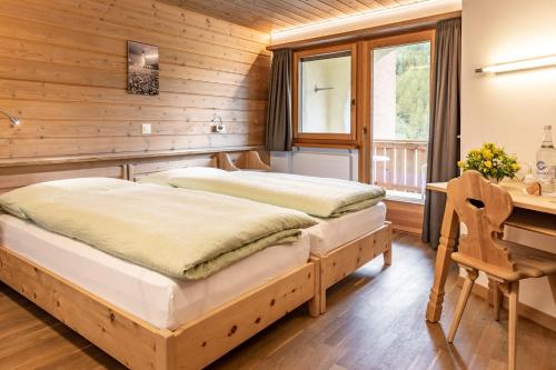 Postel nebo postele na pokoji v ubytování Hotel Landgasthof Staila