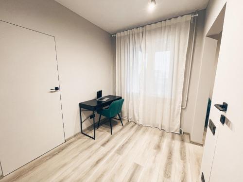 Svetainės erdvė apgyvendinimo įstaigoje Pavasario g. apartamentai