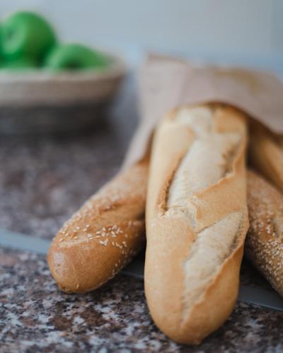 a close up of two loaves of bread on a counter at Residence Poseidon in Spartia