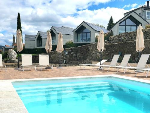 The swimming pool at or close to Miradores do Sil Hotel Apartamento