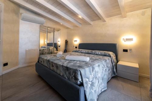 Ένα ή περισσότερα κρεβάτια σε δωμάτιο στο Mughetto Apartment
