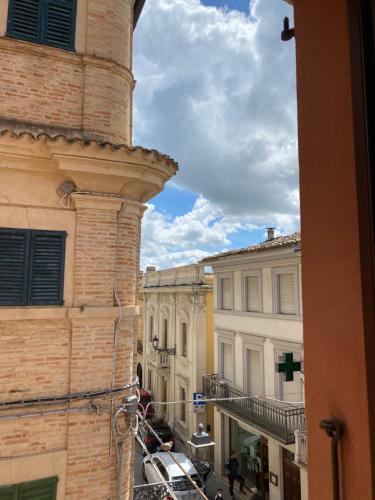 a view from an alleyway between two buildings at B&B Terrazza Sul Borgo in Mogliano