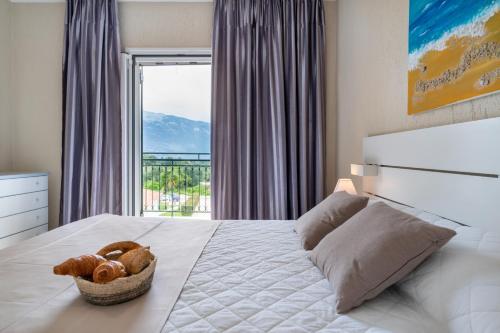 Posteľ alebo postele v izbe v ubytovaní Residence Poseidon