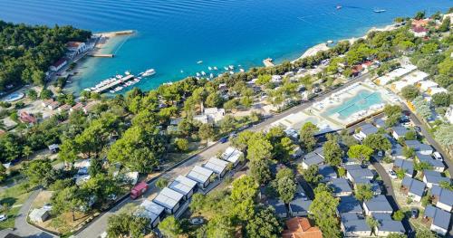 an aerial view of a resort next to the water at Rosmarin&Olive Premium Mobile Homes in Selce
