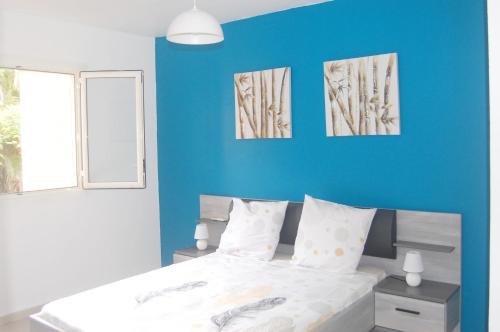 Postel nebo postele na pokoji v ubytování Joli appartement rénové à neuf