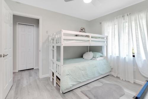 Postel nebo postele na pokoji v ubytování Everglades Breath 3bed 2 bath Villa
