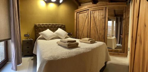 Giường trong phòng chung tại Suleiro de Xusto