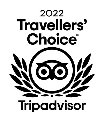 a logo for the travelers choice triadvisor at Camp Waipu Cove in Waipu