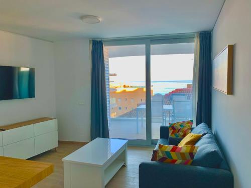 Zona de estar de Apartamento con preciosas vistas - Playa de Carvajal