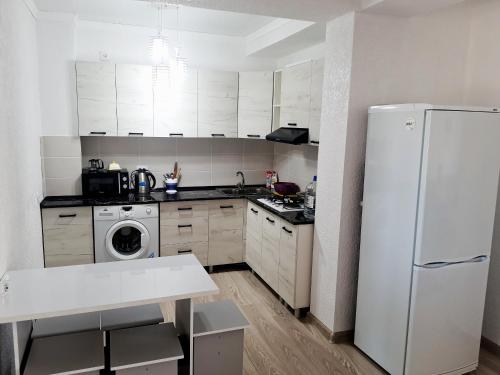 Kuchyň nebo kuchyňský kout v ubytování Cottage ЦО Paris