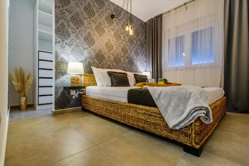 Ένα ή περισσότερα κρεβάτια σε δωμάτιο στο Green Residence Villa Zadar