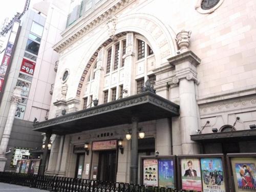 a building on a city street with a building at Ark Hotel Osaka Shinsaibashi -ROUTE INN HOTELS- in Osaka