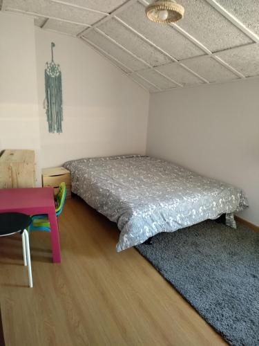 Ένα ή περισσότερα κρεβάτια σε δωμάτιο στο Casa do Doque