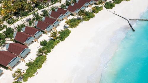 an aerial view of a resort on the beach at OBLU XPERIENCE Ailafushi - All Inclusive with Free Transfers in Male City