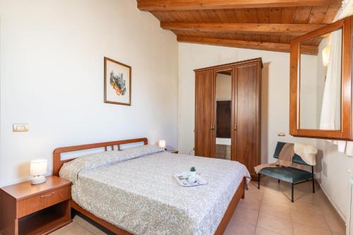 En eller flere senge i et værelse på Casa Orfea