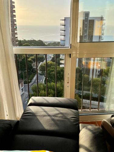 Ruang duduk di Cosy, seaview apartment, close to beach and bars -Edificio RHIN