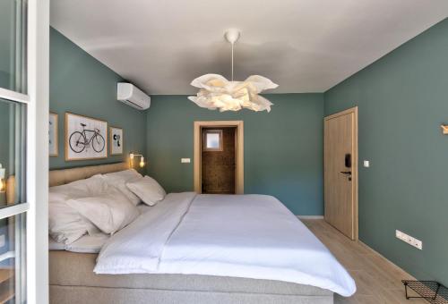 Letto o letti in una camera di Villa Amaleo