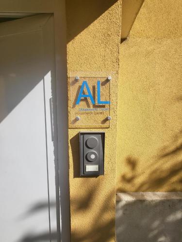 a sign on the side of a building that says all at What Else - Fatima in Fátima