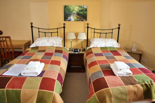 Voodi või voodid majutusasutuse Wortley Cottage Guest House toas