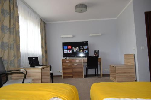 Μια τηλεόραση ή/και κέντρο ψυχαγωγίας στο Hotel Alpex View