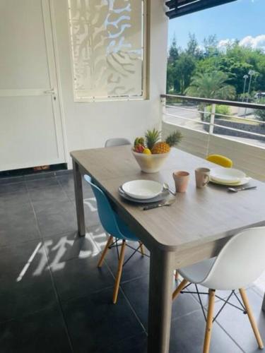 Φωτογραφία από το άλμπουμ του LEU FLAMBOYANT Appartement 2 pièces σε Saint-Leu