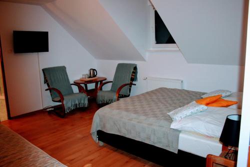 Katil atau katil-katil dalam bilik di Chata za wsią