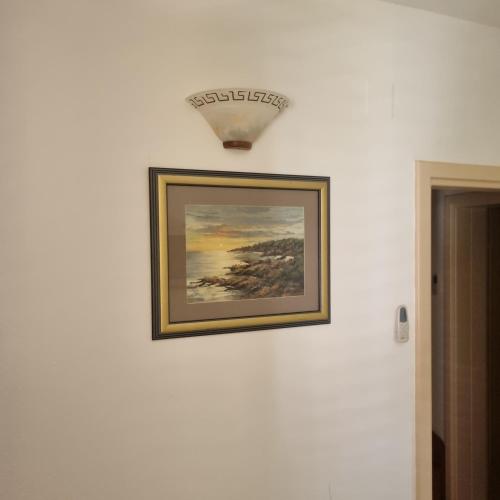 a picture of a painting on a wall at Villa Mila in Bol