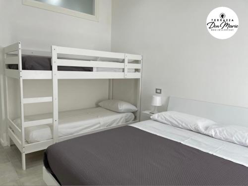 Ένα ή περισσότερα κρεβάτια σε δωμάτιο στο Terrazza Don Mario bed&breakfast