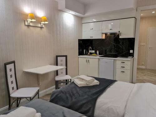 Η κουζίνα ή μικρή κουζίνα στο Apartamenty Hayduk