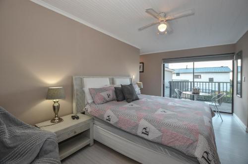 Ένα ή περισσότερα κρεβάτια σε δωμάτιο στο Sunset Villa