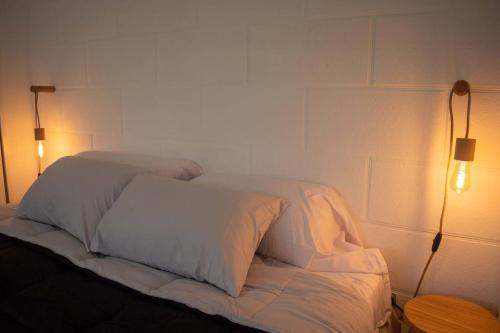Hermoso y cómodo alojamiento con patio en Nuñez tesisinde bir odada yatak veya yataklar