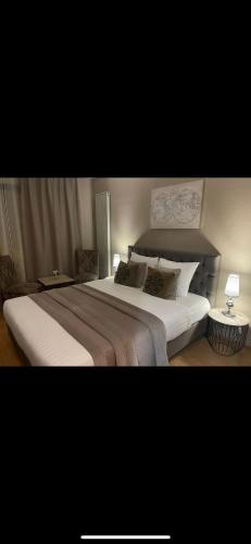 Un ou plusieurs lits dans un hébergement de l'établissement Park Hotel Airport