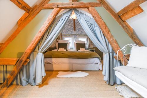 Кровать или кровати в номере Maison Simart