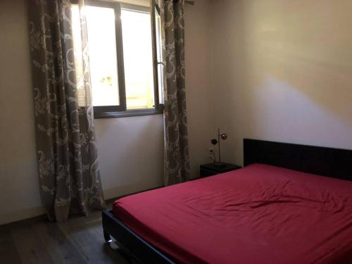 Posteľ alebo postele v izbe v ubytovaní Appartement vue panoramique sur la mer et la citadelle de Bastia