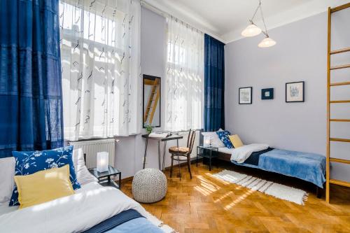 Ένα ή περισσότερα κρεβάτια σε δωμάτιο στο APT near OLD TOWN Prague by Michal&Friends