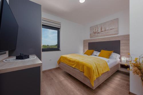 Postel nebo postele na pokoji v ubytování Villa Blue Sky 1 ZadarVillas