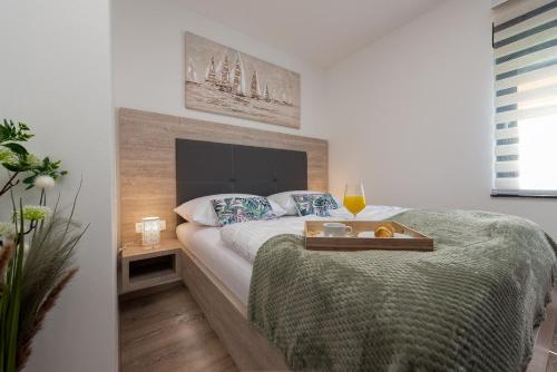 Łóżko lub łóżka w pokoju w obiekcie Villa Blue Sky 2