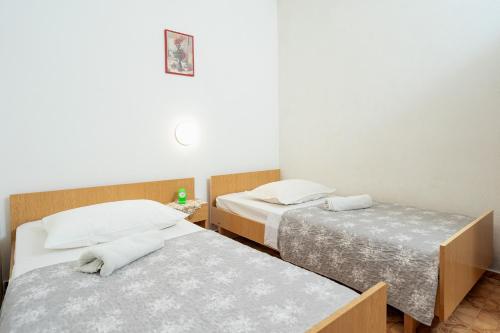 Postel nebo postele na pokoji v ubytování Holiday Home Sansevic